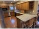 Modern kitchen featuring stainless steel appliances and granite countertops at 6089 W Hellis Dr, Muncie, IN 47304