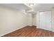 Well-lit basement bedroom features a window and closet for ample storage at 6120 Norwaldo Ave, Indianapolis, IN 46220