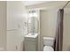 Bathroom with a modern vanity, updated fixtures, a large mirror, and a shower-tub combo at 6120 Norwaldo Ave, Indianapolis, IN 46220