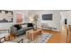 Cozy living room with modern decor, hardwood floors and natural light at 6120 Norwaldo Ave, Indianapolis, IN 46220