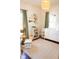 Bright Bedroom featuring hardwood floors, natural light, and stylish decor at 619 Kessler Blvd E Dr, Indianapolis, IN 46220