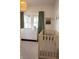 Cozy Bedroom with stylish crib and dresser with changing table at 619 Kessler Blvd E Dr, Indianapolis, IN 46220