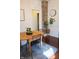 Charming dining area with a wooden table, exposed brick, and decor at 619 Kessler Blvd E Dr, Indianapolis, IN 46220