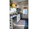 Charming kitchen featuring stainless steel appliances and warm natural light at 619 Kessler Blvd E Dr, Indianapolis, IN 46220