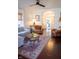 Bright living room showcasing an arched doorway, stylish rug, and inviting seating arrangement at 619 Kessler Blvd E Dr, Indianapolis, IN 46220