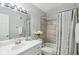 Updated bathroom with a tiled shower and a white vanity at 7220 Village Parkway Dr # 8, Indianapolis, IN 46254