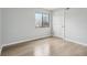 Well-lit bedroom featuring a window, closet, and neutral decor at 7220 Village Parkway Dr # 8, Indianapolis, IN 46254