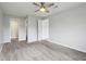 Spacious bedroom with a ceiling fan and access to multiple rooms at 7220 Village Parkway Dr # 8, Indianapolis, IN 46254