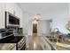 Updated kitchen featuring stainless steel appliances, stone countertops, and modern backsplash at 7220 Village Parkway Dr # 8, Indianapolis, IN 46254