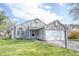 Attractive home featuring an attached two-car garage, landscaping, and a well-kept yard at 726 Westridge S Dr, Noblesville, IN 46062