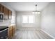 Bright eat-in kitchen with stainless appliances, neutral paint, and ample counterspace at 726 Westridge S Dr, Noblesville, IN 46062
