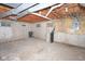 View of unfinished basement with exposed pipes, concrete walls, and utility equipment at 7421 Rogers Dr, Indianapolis, IN 46214