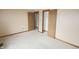 Bright bedroom featuring neutral walls, carpet, and closet space, ready for a new homeowner at 7421 Rogers Dr, Indianapolis, IN 46214