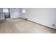 Bedroom with carpet, neutral paint, and natural light from windows at 7421 Rogers Dr, Indianapolis, IN 46214