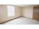 Bedroom featuring a large window and neutral walls, offering plenty of natural light at 7421 Rogers Dr, Indianapolis, IN 46214