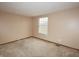 Bedroom with carpet, neutral paint, and natural light from a window at 7421 Rogers Dr, Indianapolis, IN 46214