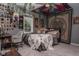 Eclectic bedroom with personal decorations, a unique ceiling tapestry, and plenty of natural light at 7957 Preservation Dr, Indianapolis, IN 46278