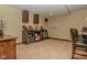 Relaxing living room with a bar featuring decorative shelves and marble countertop at 7957 Preservation Dr, Indianapolis, IN 46278