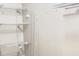 This walk-in closet includes custom metal racks providing ample storage space at 8201 E 250 S, Zionsville, IN 46077