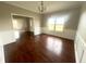 Inviting dining room with hardwood floors, wainscoting, and plenty of natural light from the windows at 8201 E 250 S, Zionsville, IN 46077