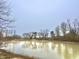 Scenic view of the pond with trees in the background, reflecting the clear sky at 8201 E 250 S, Zionsville, IN 46077