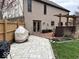 An inviting backyard with patio, deck, and well-maintained lawn for outdoor enjoyment at 8212 N Sierra Dr, Muncie, IN 47303