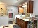 Modern bathroom featuring a double vanity, a tiled shower, and contemporary fixtures at 8212 N Sierra Dr, Muncie, IN 47303