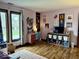 Bright bedroom with a large window, desk, and ample storage space at 8212 N Sierra Dr, Muncie, IN 47303