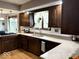 Well-lit kitchen featuring wooden floors, granite countertops, and stainless steel appliances at 8212 N Sierra Dr, Muncie, IN 47303