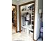 Cozy mudroom area with built-in storage, bench, and coat rack for organization at 8212 N Sierra Dr, Muncie, IN 47303