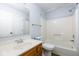 Bathroom with white vanity, updated fixtures, and shower-tub combination with bright lighting at 9029 Crook N Dr, Indianapolis, IN 46256