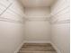 Empty closet with wire shelves and vinyl plank flooring at 955 Sand Hollow Dr, Lebanon, IN 46052