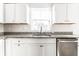 Kitchen with stainless steel appliances, granite countertops, and ample cabinet space at 955 Sand Hollow Dr, Lebanon, IN 46052