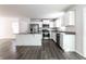 Modern kitchen with stainless steel appliances and granite countertops at 955 Sand Hollow Dr, Lebanon, IN 46052