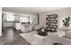 Open-concept living room and kitchen offering lots of natural light and seating at 955 Sand Hollow Dr, Lebanon, IN 46052