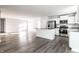 Spacious living room and kitchen combination with stainless appliances and island at 955 Sand Hollow Dr, Lebanon, IN 46052