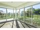 Bright sunroom with glass windows and outdoor views at 955 Sand Hollow Dr, Lebanon, IN 46052