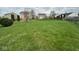 Fenced backyard with a large grassy area at 1071 Hazelwood Dr, Greenwood, IN 46143