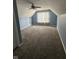 Spacious carpeted bonus room with vaulted ceilings and ample natural light at 1071 Hazelwood Dr, Greenwood, IN 46143