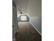 Spacious carpeted bonus room with vaulted ceilings and ample natural light at 1071 Hazelwood Dr, Greenwood, IN 46143