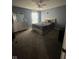 Bedroom with blue walls and natural light at 1071 Hazelwood Dr, Greenwood, IN 46143
