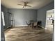 Dining room featuring modern lighting, and sleek vinyl flooring at 1071 Hazelwood Dr, Greenwood, IN 46143