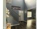 Bright and airy foyer with hardwood floors, staircase, and modern decor at 1071 Hazelwood Dr, Greenwood, IN 46143