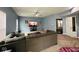Spacious living room with comfortable seating, ceiling fan, and natural light at 1071 Hazelwood Dr, Greenwood, IN 46143
