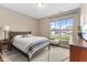 Bright bedroom with a large window and neutral decor at 11450 Wicker Ln, Noblesville, IN 46060