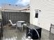 Outdoor deck features an outside dining set and backyard access at 1198 Paradise N Way # C, Greenwood, IN 46143