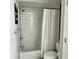 Clean and modern bathroom featuring a bathtub with subway tile surround and a shower curtain at 1198 Paradise N Way # C, Greenwood, IN 46143