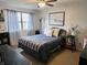 Cozy bedroom with a comfortable bed, soft lighting, and a window for natural light at 1198 Paradise N Way # C, Greenwood, IN 46143