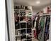 Organized walk-in closet with shelves, clothing racks, and ample storage space for shoes and accessories at 1198 Paradise N Way # C, Greenwood, IN 46143