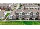 Aerial view of attractive multi-Gathering homes with well-kept lawns and mature landscaping at 12658 Watford Way, Fishers, IN 46037